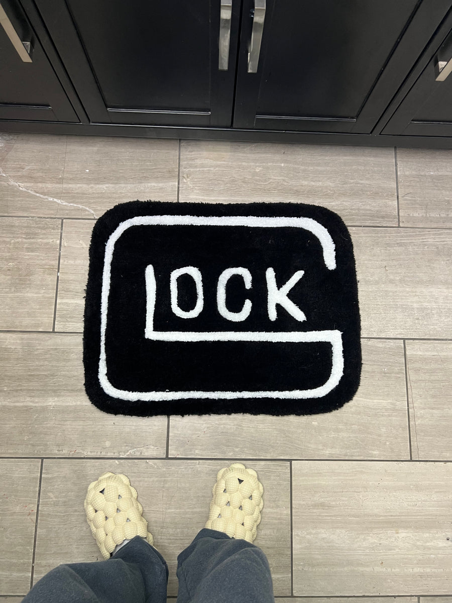 Logo rug, take two, hand-tufted rug by RugsbyDJ